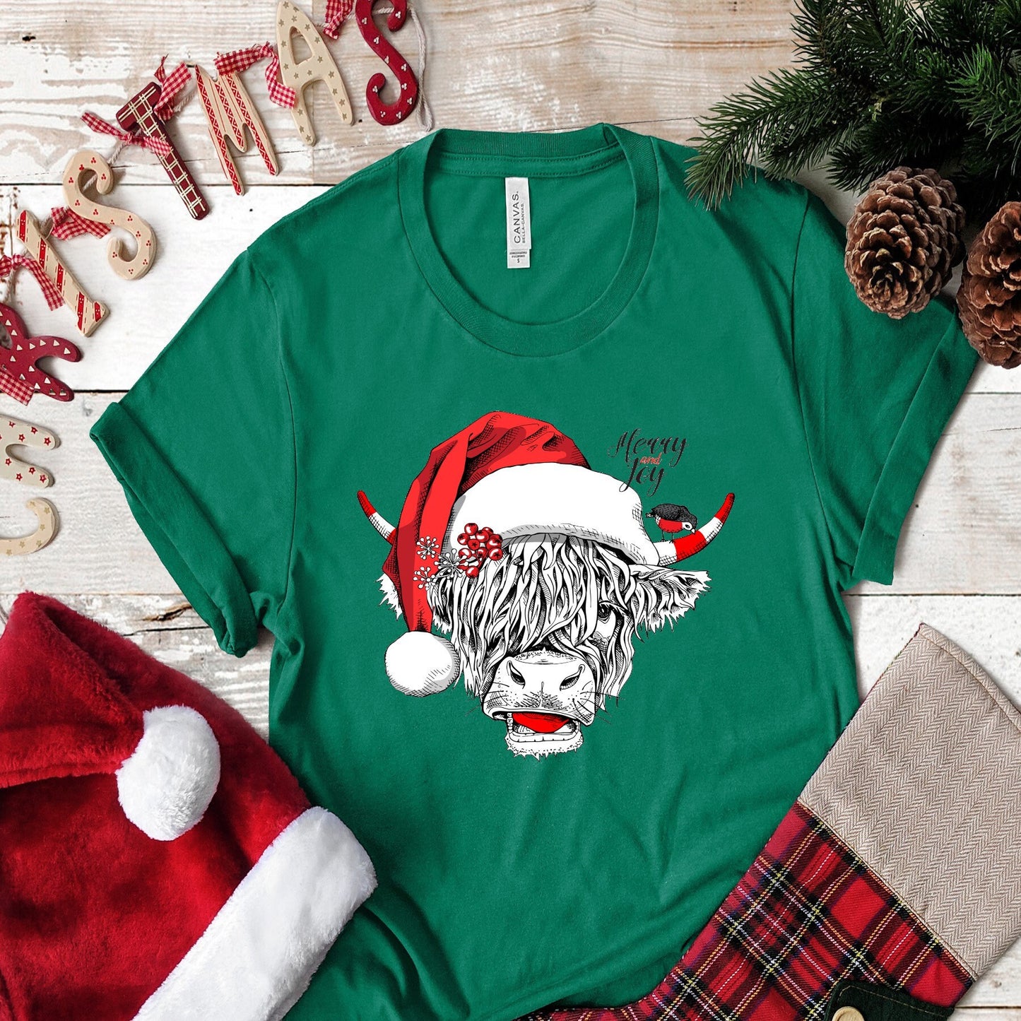 Christmas Long Haired Cow Highland Cow Santa Hat Merry and Joy .  design t-shirt